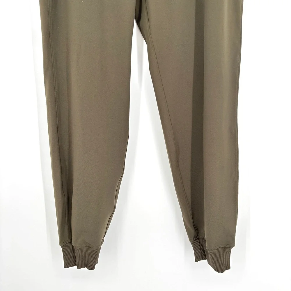 Lululemon‎ On The Fly Jogger 7/8 Mid Rise Olive Green Stretch Drawstring Size 6